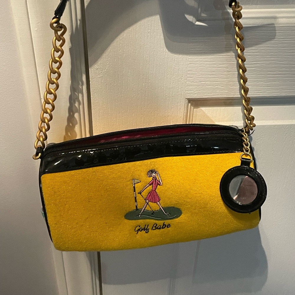 Yellow MaggiB golf purse.